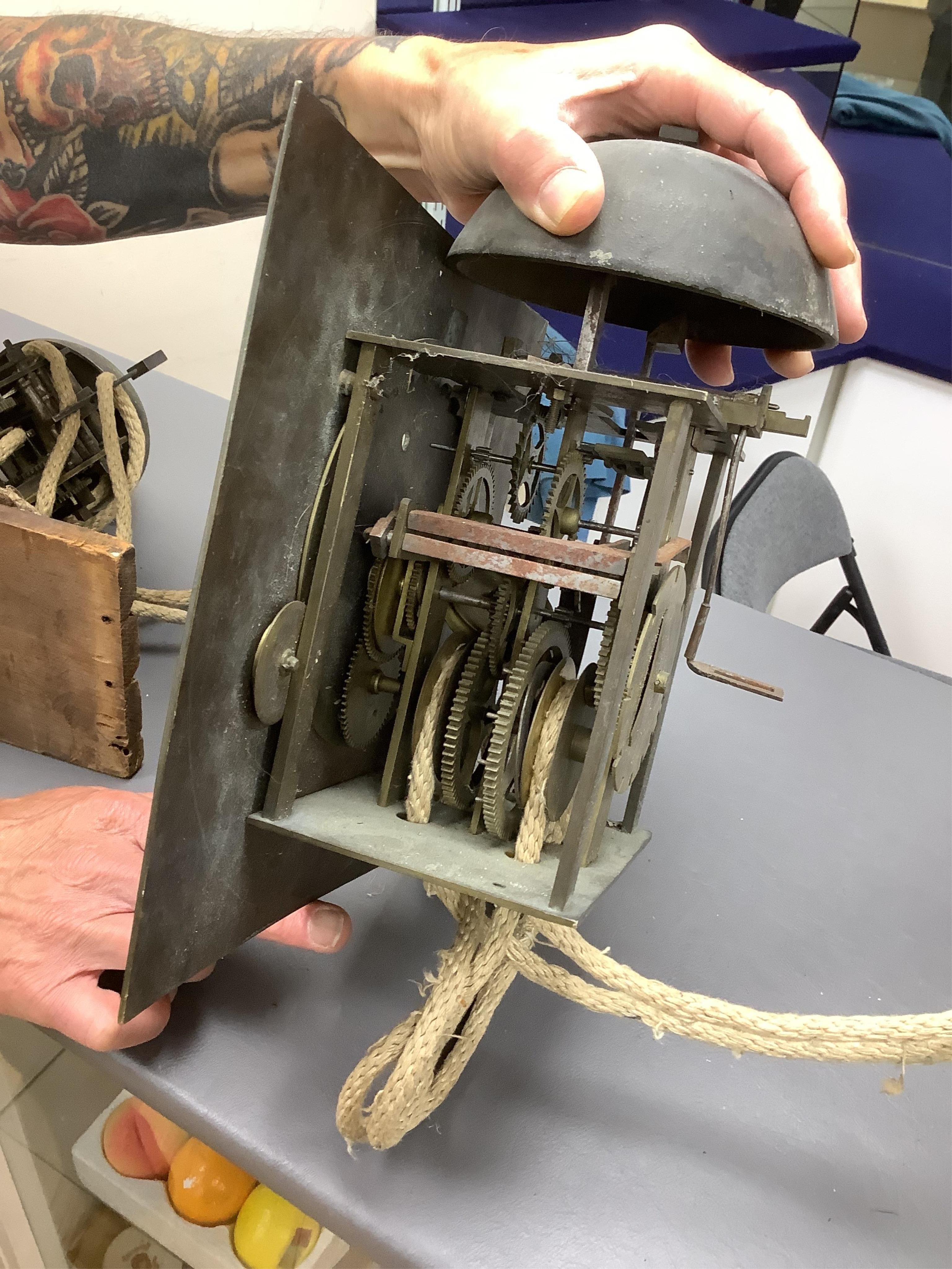 A brass dial wall clock, birdcage movement, 30cm square, unknown if working